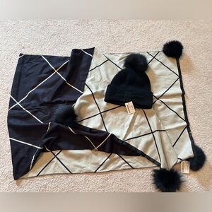 Elegant Black and Cream Scarf with Pom-Pom Accents